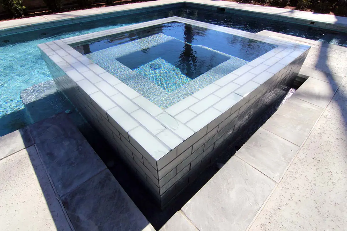 A square pool inside the swimming pool